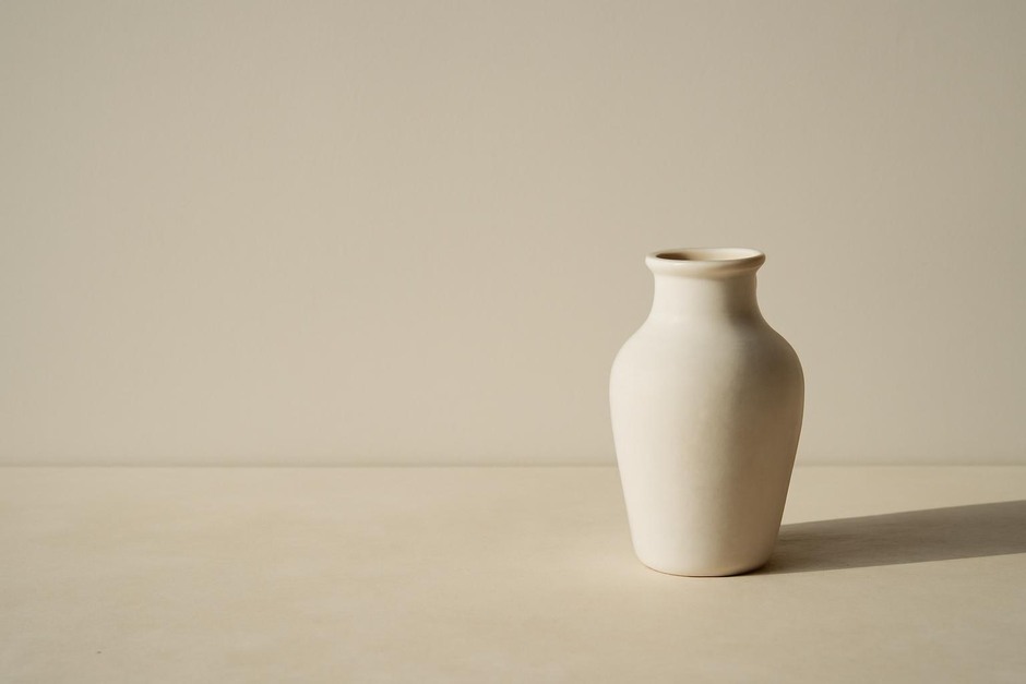 Sparse still life with generous negative space around a single object